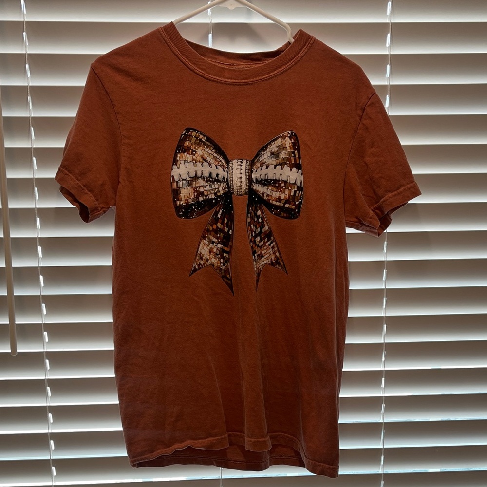 Women’s Burnt Orange T-Shirt with Football Bow Design